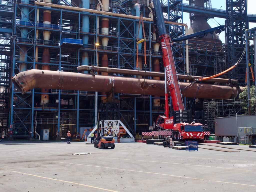 's 400T Grove mobile crane helping to rotate & place the downcomer